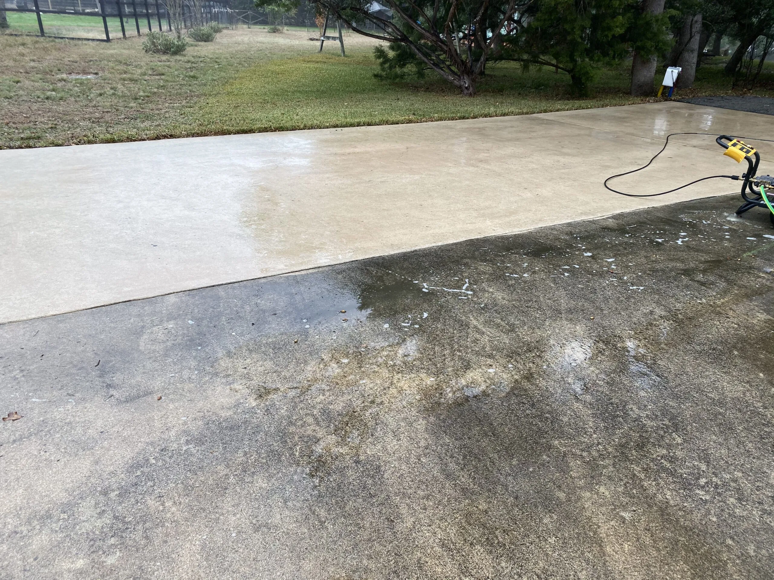 Driveway pressure washing before and after in San Antonio