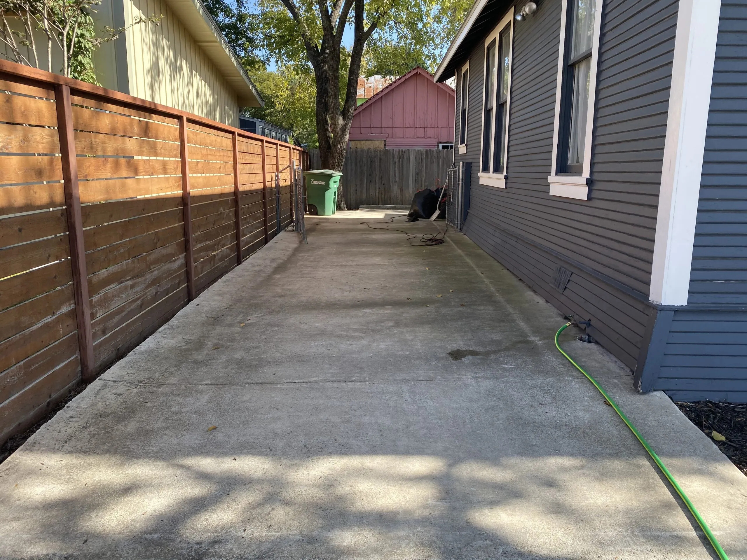 Clean concrete sidewalk after pressure washing